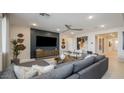 Comfortable living room with contemporary decor, ceiling fan, and a spacious layout at 12708 W Corona Ave, Avondale, AZ 85323