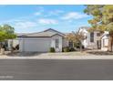 Lovely single-story home with a two car garage and a beautifully landscaped front yard with mature tree at 510 W Marconi Ave, Phoenix, AZ 85023