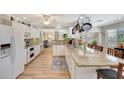 Spacious kitchen featuring granite countertops, a center island, and stainless steel appliances at 609 E Winter Dr, Phoenix, AZ 85020