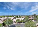 Neighborhood street view showcases beautiful homes, mature trees, and mountain views at 722 N Butte Ave, Chandler, AZ 85226