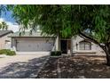 Beautiful two-story home with a two car garage and mature shade tree at 1898 E Kent Ave, Chandler, AZ 85225
