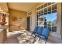 Inviting front porch area with comfortable seating and ample natural light at 29023 N 46Th Way, Cave Creek, AZ 85331