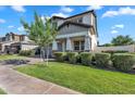 Beautiful home exterior showcasing a well-kept lawn and attractive shrubbery at 3415 E Arabian Dr, Gilbert, AZ 85296