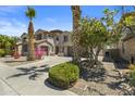 Beautiful home with landscaped front yard and palm trees under a bright sky at 4305 S Antonio --, Mesa, AZ 85212