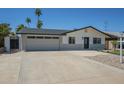 Charming single-story home with desert landscaping, a spacious driveway, and a welcoming entrance at 520 N 23Rd St, Mesa, AZ 85213
