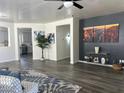 Spacious living room featuring modern decor, stylish furnishings, and an open layout for comfortable living at 6421 S 23Rd Dr, Phoenix, AZ 85041