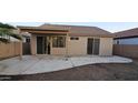 Inviting covered patio with a large paved area, perfect for outdoor entertaining at 6722 W Shannon St, Chandler, AZ 85226
