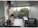 Relaxing covered patio with outdoor seating and heater overlooking desert landscape at 111 S Greenfield Rd # 785, Mesa, AZ 85206