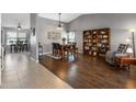 Inviting dining area featuring hardwood floors and stylish decor at 4118 W Fallen Leaf Ln, Glendale, AZ 85310