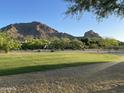 Community front lawn space with mountain views in the distance at 5635 E Lincoln Dr # 26, Paradise Valley, AZ 85253