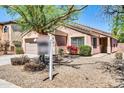 Charming single story home featuring low maintenance landscaping and a neutral color palette at 12938 W Mandalay Ln, El Mirage, AZ 85335