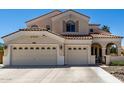 Charming two-story home featuring a three-car garage and a welcoming tiled roof at 2489 E Sequoia Dr, Chandler, AZ 85286
