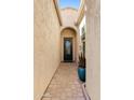 Covered entryway featuring an ornate front door and a decorative planter at 4535 E Navigator Ln, Phoenix, AZ 85050