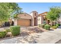 Beautiful single-story home featuring a landscaped front yard and a two-car garage at 4535 E Navigator Ln, Phoenix, AZ 85050