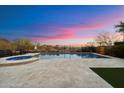 Relaxing pool with a built in spa and beautiful desert views at 6535 W Gold Mountain Pass, Phoenix, AZ 85083