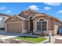 Charming single-story home with a well-manicured front yard and a cozy bench, showcasing curb appeal at 18845 N 23Rd Pl, Phoenix, AZ 85024
