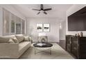 Staged living room with modern furniture, creating a comfortable and inviting atmosphere at 3302 N 7Th St # 344, Phoenix, AZ 85014