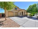 Inviting home with a two-car garage, a welcoming porch, and desert landscaping at 3788 E Sexton St, Gilbert, AZ 85295