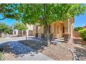 View of the front porch featuring stone accents and a landscaped yard at 3788 E Sexton St, Gilbert, AZ 85295