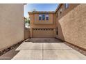 Spacious driveway leading to an attached two-car garage with ample parking space at 514 N 112Th Dr, Avondale, AZ 85323