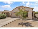 Inviting single-Gathering home showcasing neat landscaping, two-car garage, and a well-maintained facade at 812 S Fern Ct, Gilbert, AZ 85296