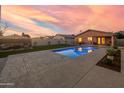 This beautiful pool has updated concrete trim, and is surrounded by manicured turf for a relaxing outdoor experience at 9013 E Shooting Star Dr, Gold Canyon, AZ 85118
