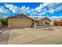 Charming single-story home with desert landscaping and a two-car garage with ample parking space at 2245 Leisure World --, Mesa, AZ 85206