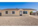 Charming single-story home featuring a gravel front yard and covered carport at 2037 W Wood Dr, Phoenix, AZ 85029