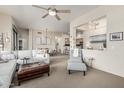 Open floor plan with comfortable seating, stylish decor, and a view into the modern kitchen at 2989 N 44Th St # 3044, Phoenix, AZ 85018