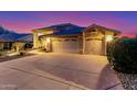Beautiful home with a spacious driveway and a well-maintained desert landscape at 30026 N 47Th St, Cave Creek, AZ 85331