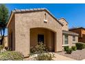Charming home exterior with desert landscaping, sidewalk, and covered entryway at 3020 E Megan St, Gilbert, AZ 85295