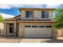 Charming two-story home with neutral paint and a two car garage at 4245 E Shannon St, Gilbert, AZ 85295