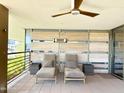 Outdoor relaxation area with cushioned lounge chairs, offering a serene space to unwind and enjoy the view at 7157 E Rancho Vista Dr # 2005, Scottsdale, AZ 85251