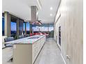 Sleek, modern kitchen with stainless steel appliances, granite countertops, and a spacious island at 7180 E Kierland Blvd # 1218, Scottsdale, AZ 85254