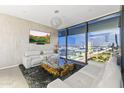 Comfortable living room with stylish decor, a modern coffee table, and stunning city views at 7180 E Kierland Blvd # 1218, Scottsdale, AZ 85254