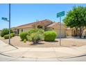Corner lot home with mature landscaping and manicured yard at 8331 E Plata Ave, Mesa, AZ 85212