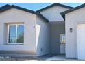 Charming single-Gathering home with a modern architectural style and well-manicured landscaping at 1819 S Coconino S Dr, Apache Junction, AZ 85120