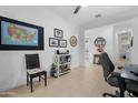 Spacious office space with views into other areas of the home at 40365 W Bravo Dr, Maricopa, AZ 85138