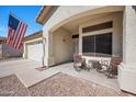 Cozy front porch area with seating, perfect for relaxing outdoors at 11840 N 59Th Ln, Glendale, AZ 85304