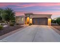 Beautiful single-story home featuring desert landscaping and a brick-lined driveway at 12780 W Desert Vista Trl, Peoria, AZ 85383