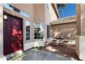Cozy front porch featuring a seating area, creating a welcoming entrance to the home at 1381 N Alexis Dr, Gilbert, AZ 85234