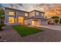 Beautiful two-story home boasts lush artificial turf, rock landscaping, and a wide driveway at 2754 E Michelle Way, Gilbert, AZ 85234