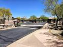Gated community entrance at The Villages at Terravella offers security and landscaped surroundings at 3330 W Gran Paradiso Dr, Phoenix, AZ 85086