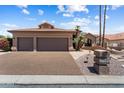 Beautiful home featuring desert landscaping, a two-car garage, and an inviting entrance at 3797 N 156Th N Dr, Goodyear, AZ 85395