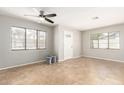 Bright living room featuring tile floors, neutral paint, and windows for natural light at 4303 N 18Th St, Phoenix, AZ 85016