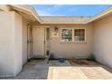 Inviting front entrance with charming details and covered porch area at 5319 E Gelding Dr, Scottsdale, AZ 85254