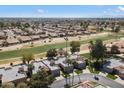 Stunning aerial view of residential neighborhood near a golf course at 19205 N 93Rd Ave, Peoria, AZ 85382
