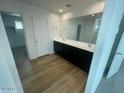 Bathroom featuring a large vanity with dual sinks and ample counter space at 37568 W Patterson St, Maricopa, AZ 85138