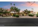 Spacious single-story home with mature trees, desert landscaping, and a circular driveway at 4744 E Foothill Dr, Paradise Valley, AZ 85253