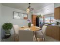 Eat-in kitchen has lots of natural light, a dining table, and wood cabinetry at 154 W 5Th St # 212, Tempe, AZ 85281